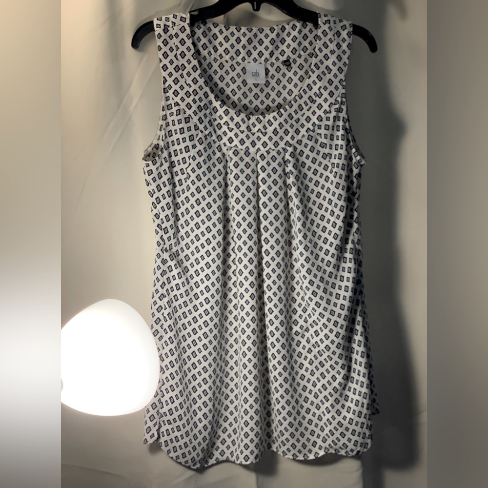 Cabi gently loved. In new condition. Size large. Cream with blue/gold design